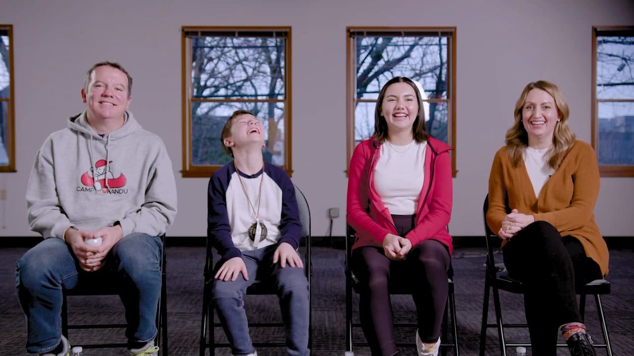 family smiling and laughing
